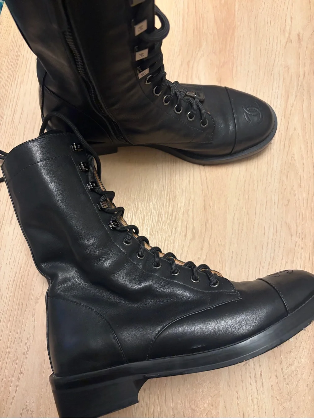 CHANEL Black Leather Lace-Up Combat Boots with Logo Cap